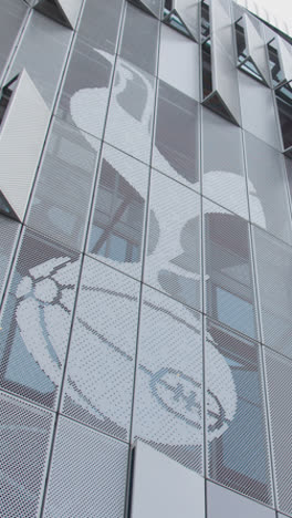 Vertical-Video-Of-Exterior-Of-Tottenham-Hotspur-Stadium-The-Home-Ground-Of-Spurs-Football-Club-In-London